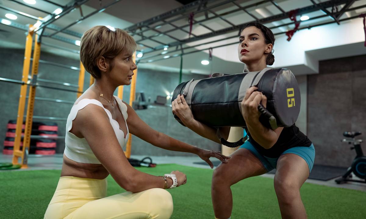 fitness over 40 men tracking recovery metrics on smartwatch