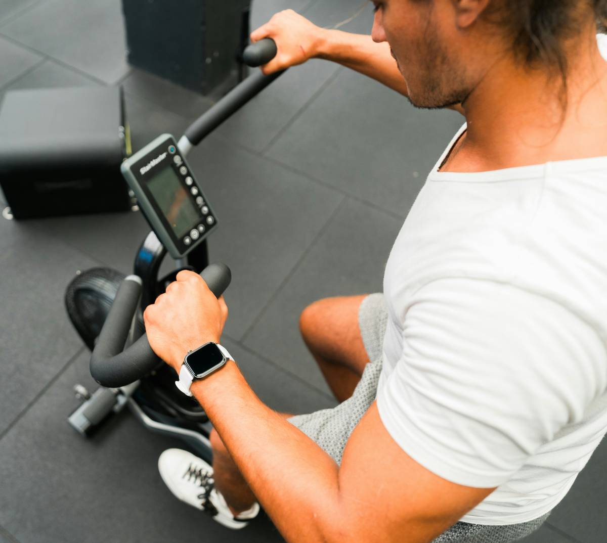 men over 40 workout app showing smart recovery metrics on smartphone screen